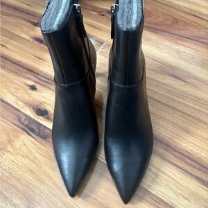 Nine West Black Ankle Boots with Sleek Silhouette and Easy Slip-On
